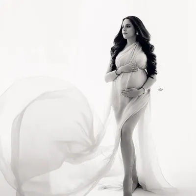 The black and white version of the ethereal drape look. I'll teach you how my editing process transforms a color photo into a timeless monochrome masterpiece, emphasizing light and form.