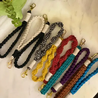 A quick look at the variety of macrame wristlets I make. They come in many colors and knot styles, perfect for keeping your keys handy or just adding a pop of color to your main bag.
