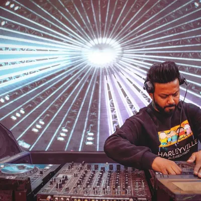 Behind the decks with a massive LED screen behind me. As a VDJ, the visuals are your second instrument. I'll teach you how to control them live for maximum impact.
