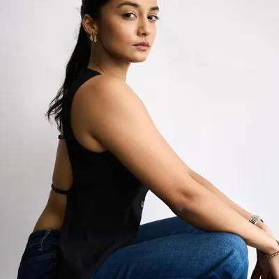 A classic example of my clean makeup work, featuring flawless skin and a simple, sleek ponytail for a model's test shoot.