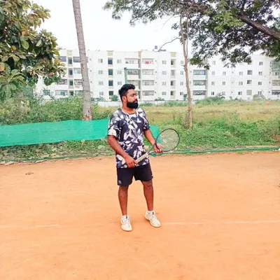 Here I am on the court, ready for a session. As your coach, I am committed to being hands-on, bringing energy and personalized guidance to help you become the best player you can be.
