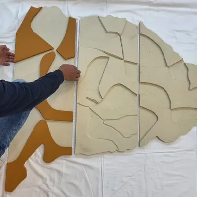 Assembling a large, multi-panel modular artwork for a client in Hyderabad. Each piece is custom-cut from MDF board and designed to fit together seamlessly.
