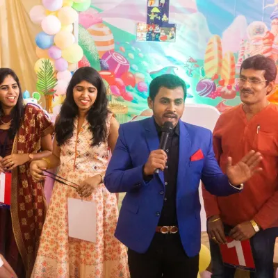 Here I am leading a fun activity with guests at a family function in Bangalore. Getting the adults involved in games is a great way to liven up any party.