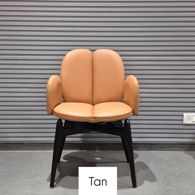 This multipurpose chair with a unique backrest design is available in a classic tan color. It's a versatile piece for homes, offices, or restaurants.