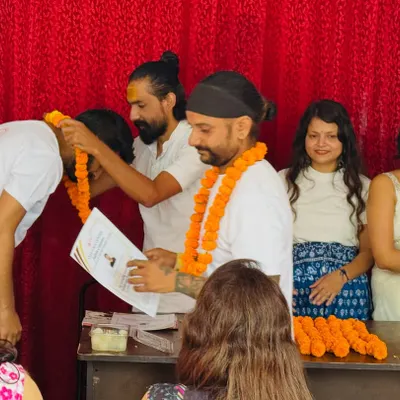 A moment from our YTTC closing ceremony. I am honoring a student with a traditional mala, celebrating his dedication and the completion of his journey with us.