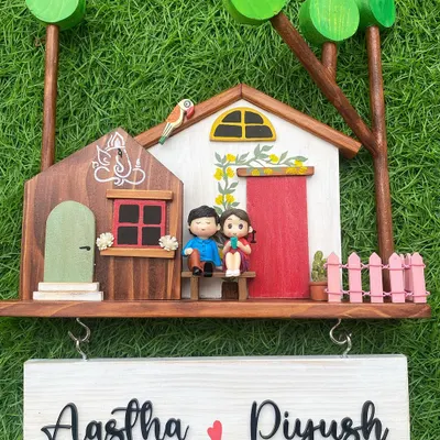 This is one of my most popular designs, and it's easy to see why! The detailed miniature house, complete with a couple figurine and a hand-painted Ganesha, brings so much warmth and personality to an entryway.