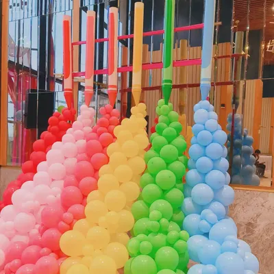 A fun and creative balloon sculpture I made to look like giant crayons spilling color. This kind of playful and imaginative installation is perfect for a creative company's event, a product launch, or a corporate family day.