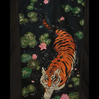 This is a direct, detailed shot of the artwork featuring a tiger moving through a dark pond filled with lily pads and pink blossoms. I used rich colors to make the scene come alive.