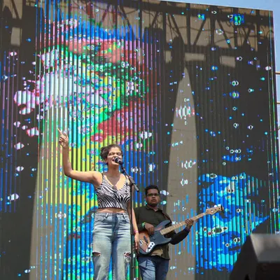 On stage at the Under 25 Summit. Performing with a full band and a giant LED screen behind me was such a surreal experience. This is the energy I bring to large-scale music festivals.