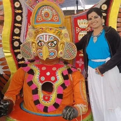 A behind-the-scenes moment from our performance at the 'Namma Karavali Utsava'. Here I am with a prop used in our semi-classical dance on the theme of nature.