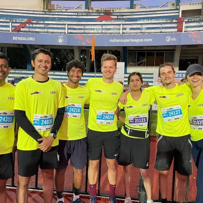 It's not just about individual performance; it's about the community. Here's my crew and I after crushing a half marathon. We train hard together and celebrate our achievements together, because that's what keeps us motivated.