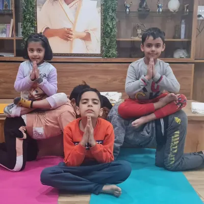 Our kids' yoga classes are all about teamwork and trust. This acro yoga pose shows how children learn to support each other, building not just physical strength but also communication skills and confidence in a fun, playful setting.