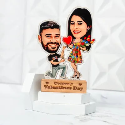 A fun and romantic caricature stand-up for Valentine's Day. I'll turn your photo into this cute cartoon proposal scene, mounted on a personalized wooden base.