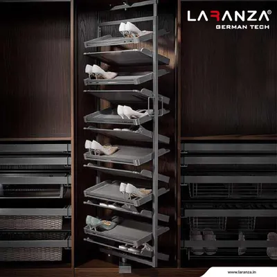 This is my revolving shoe rack, a truly luxurious and practical way to store your footwear. It rotates smoothly, allowing you to see and select any pair with ease, from heels to flats.