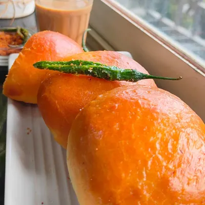I found a healthier version of your favorite snack: the Baked Vada Pav. Served with a green chili, it's the perfect accompaniment to a cup of chai.