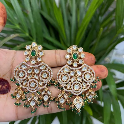 These oversized chandbali earrings are a statement in themselves. Rent them to elevate a simple outfit for a wedding reception or sangeet.