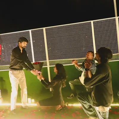 The ultimate question. We set up this beautiful, candle-lit proposal scene on a turf, complete with a heart-shaped floral arch, before our dancers kicked off the surprise.