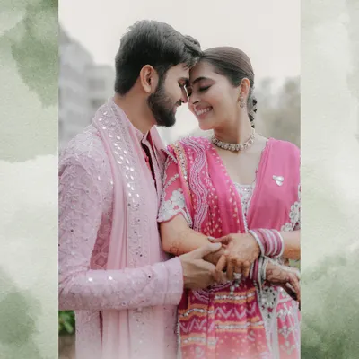 A moment of quiet connection, their foreheads touching, smiles on their faces. This is the kind of intimate portrait that speaks volumes without a single word.