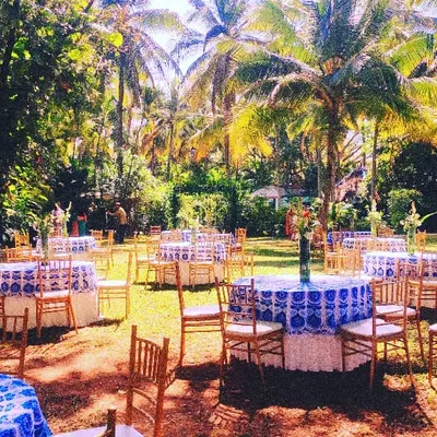 Our lawns provide a stunning canvas for daytime events. This reception setup, with its bright and cheerful decor, shows how we can bring any theme to life under the sun.