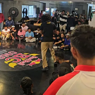 The atmosphere at the Red Bull BC One South Qualifier was electric. A dancer commands the cypher, surrounded by the community, showcasing the raw energy and spirit of a true hip-hop battle.