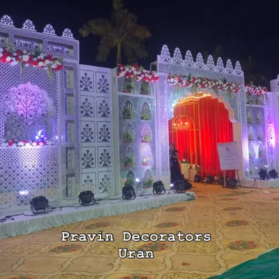 We built this magnificent palace-style entrance gate from the ground up. It features intricate jali work, floral decorations, and dramatic lighting to give guests the feeling of entering a royal wedding.