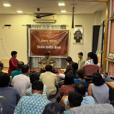 The unique atmosphere of an intimate home concert, or 'baithak'. I am accompanying santoor player Ninad Daithankar here. In these settings, the connection between the artists and the listeners is immediate and powerful.