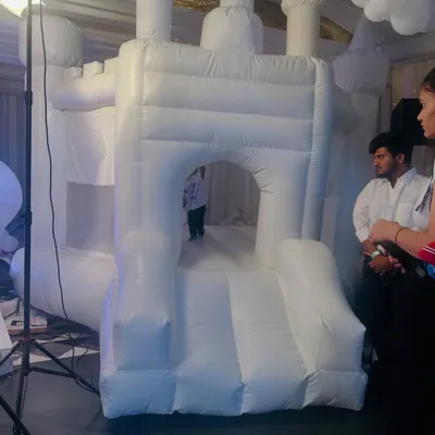 This is our elegant all-white bouncy castle set up for an indoor event. Its simple and modern design makes it a great fit for parties where you want the fun of a bouncy without bright, distracting colors.
