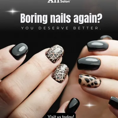 Make your nails the centerpiece of your look with our custom art services. This leopard print design is expertly applied alongside a rich, glossy black gel polish for a modern and edgy finish.