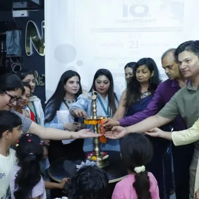 The ceremonial lamp lighting at our 18th-anniversary event. It was a beautiful moment shared with my team, clients, and their families.