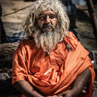 This is one of my favorite portraits from the Maha Kumbh. To capture authentic moments, I believe you have to get close and build a connection, even if it's brief. The intensity in his eyes tells a story that words cannot.