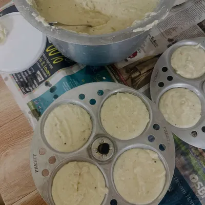 Preparing the batter for our soft and fluffy idlis. We ferment it naturally to get that authentic South Indian taste and texture.
