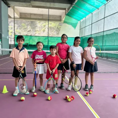 A group of our Red Batch stars ready for action. We focus on creating a supportive and energetic environment where kids can build confidence and make friends.