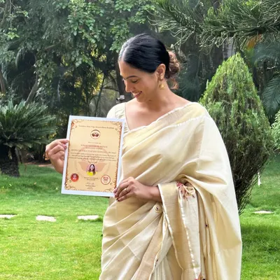 A proud moment holding my 500-hour advanced yoga teacher training certificate. This qualification represents a deep dive into yoga philosophy, anatomy, and advanced teaching methodologies.