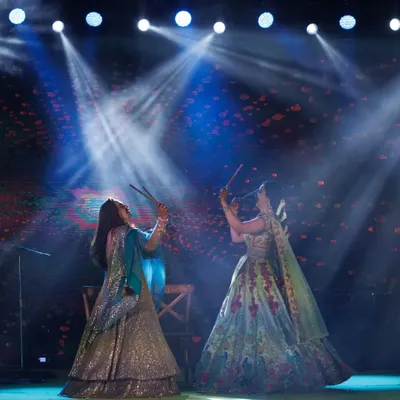 A dandiya performance at a Mehendi ceremony. We incorporate traditional dance styles with a modern twist to fit the vibe of any event.
