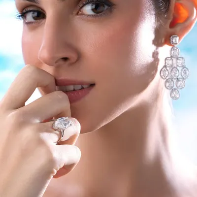 Shooting rocks for Solitario Diamonds with the mesmerizing Claudia, who was also the DJ on set! This shot captures a moment of playful elegance, with the light catching the stunning ring and earrings perfectly.