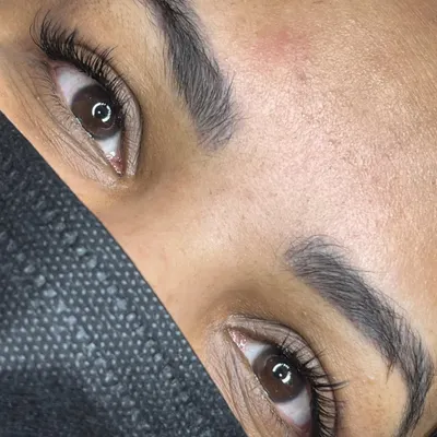 A beautiful example of our natural lash extensions. This close up shot shows how we blend the extensions seamlessly with the client's own lashes for a subtle, 'I woke up like this' effect. Perfect for adding a bit of length and volume.
