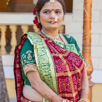 A beautiful, elegant makeup look for my own mother. I focused on creating a fresh, lifted appearance with soft colors that complemented her traditional Gujarati saree, ensuring she looked graceful and radiant.