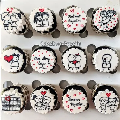 Celebrating love with these cute, hand-painted cupcakes. I created two sets of these for different clients, each telling a unique love story through simple drawings on fondant.