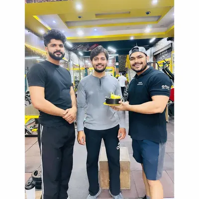 Celebrating a client's birthday in the gym. We are a team, and we celebrate each other's milestones.