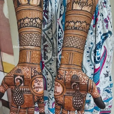 A special request for the groom's sister, this design includes the phrase 'Bhai Ki Sagai' and 'Dulhe Ki Behen' right on the palms.