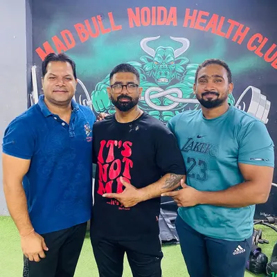 With my clients at our home base, Mad Bull Noida Health Club. We are a community of lifters dedicated to getting stronger together.