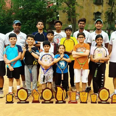 A proud moment for the entire academy. Our players and coaches celebrating a successful run at the Delhi/NCR Inter-School Open Tennis Tournament with a huge collection of trophies.