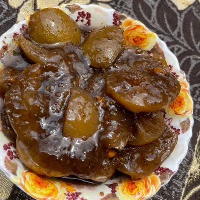 This is my sweet and tangy lemon preserve, slow-cooked until the lemons are soft and syrupy. It’s a classic `dadimaa` recipe that is a wonderful digestive and pairs well with simple meals.