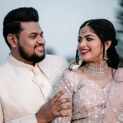 A candid moment of shared laughter between a couple during their engagement shoot. We believe the best photos come from genuine emotions.