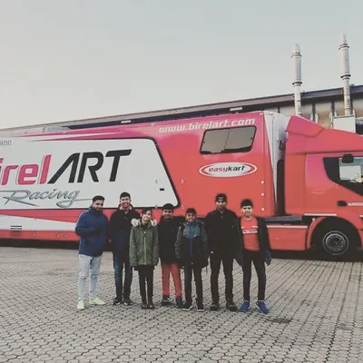 Our team of drivers in front of the official Birel ART Racing transporter truck during winter testing in Italy. This is the mobile headquarters for our European campaigns.