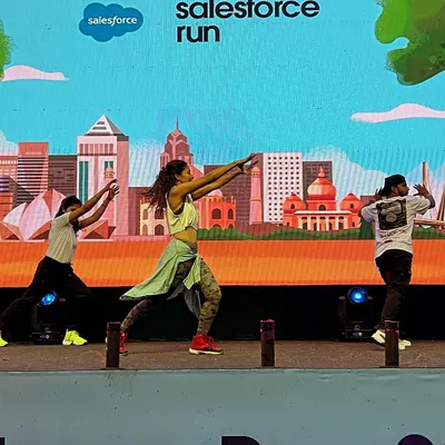 A powerful, synchronized move during the Salesforce Run warm-up. My choreography is designed to be visually impressive from the stage while remaining simple enough for a large, diverse corporate audience to join in.