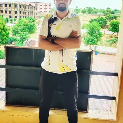 A photo of me at our academy grounds. I am committed to providing the best sports coaching and mentorship to the youth of our community.