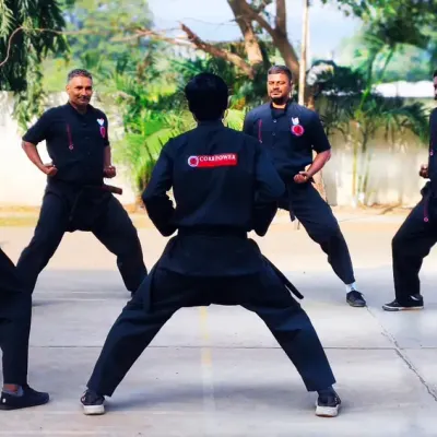 Our senior students and instructors practicing a form in a circle. This demonstrates the teamwork and mutual respect that defines our advanced training sessions.