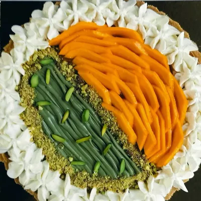 My Half & Half Mango Pistachio Cheesecake Tart is the best of both worlds. One side features sweet, fresh mango, while the other has a rich, nutty pistachio cream.
