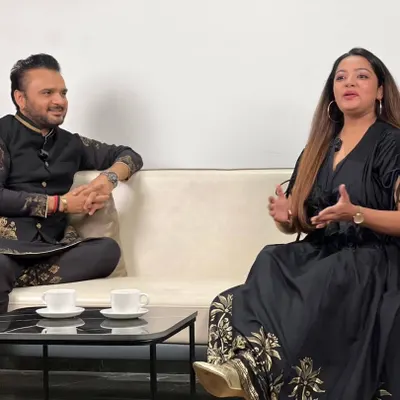 In a conversational interview with singer Parthiv Gohil for the 'Rangilo Re' YouTube channel. This shows my ability to host more than just the main stage, engaging in one-on-one interviews to create promotional content.